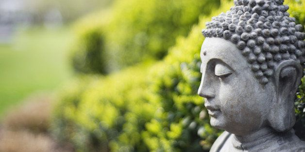 buddha image in a garden