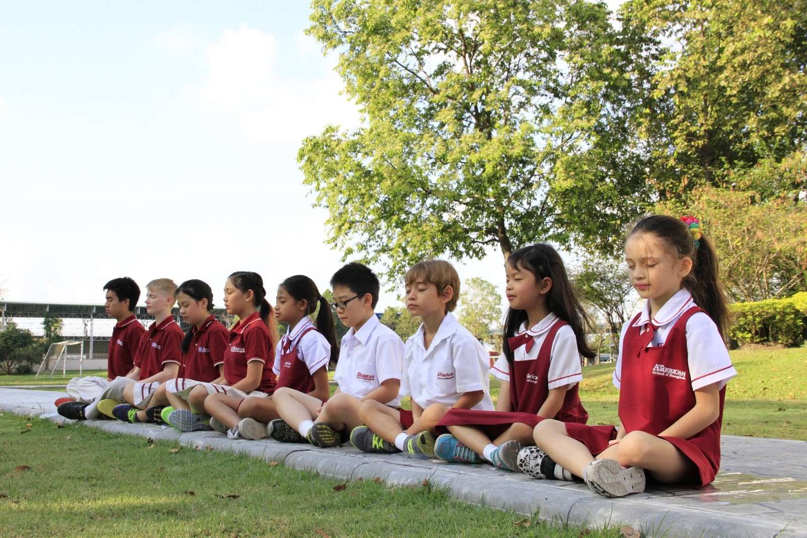 elementary students in meditation